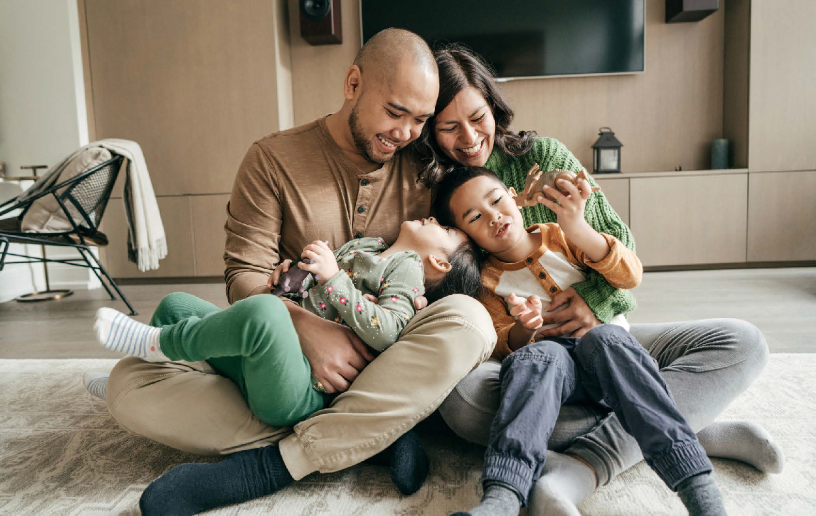 Family sitting on floor