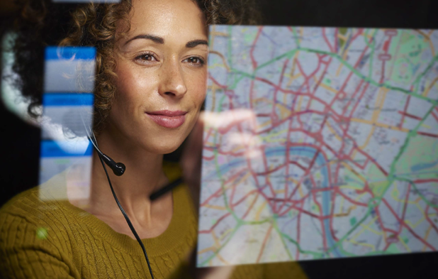 Emergency response phone agent looking at computer screen